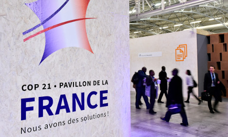 France tells COP21 negotiators to speed up