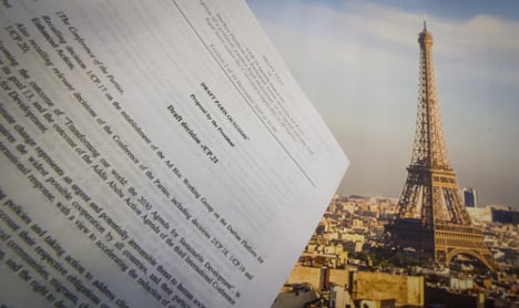 Paris climate summit talks go into overtime