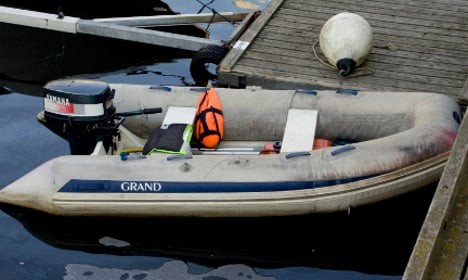 Refugees reach Sweden in an inflatable boat