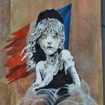 Banksy calls out use of teargas in Calais camp