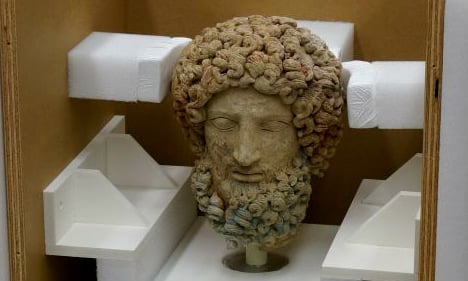 US museum gives Italy back looted head of Greek statue