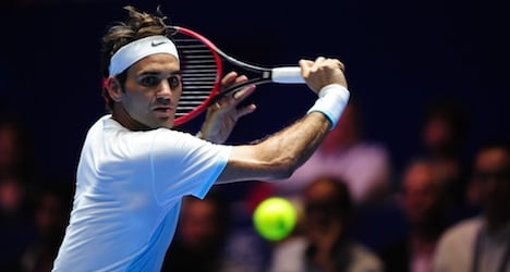 Federer breezes past Kamke in Brisbane