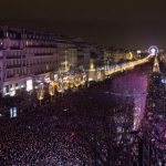 Defiant French throng Paris to bid adieu to 2015