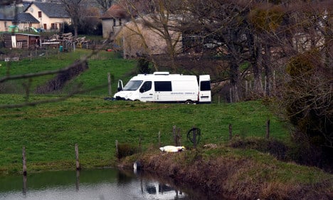 French farm inspector was strangled before pond death