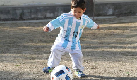 Signed Messi shirt is dream come true for Afghan boy