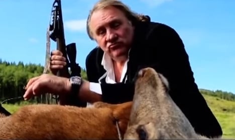 Depardieu stars as gun-toting deer hunter in Russian advert