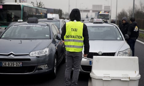 Taxi wars: Mini-cab drivers continue protests in Paris