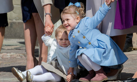 Estelle pulling her younger cousin Princess Leonore to her feet at King Carl XVI Gustaf's 69th birthday celebrations in April 2015.Photo: Jonas Ekströmer/TT