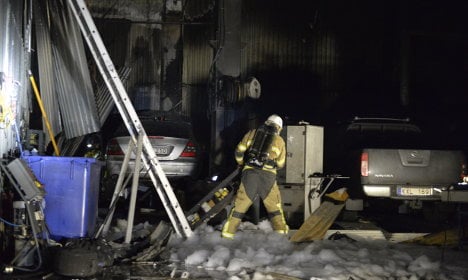 Firefighters tackle two burning buildings