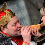 Yes, this is a picture of Thuringian sausage king Rudi Butkus letting queen Miriam Wagner chomp on his wurst.Photo: Photo: DPA