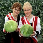 Another favourite German food, the cabbage, naturally has its own queen. This is Sonja I. (l) und Britt I., proud cabbage queens of Schleswig-Holstein in 2010.Photo: Photo: DPA