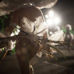 <b>Carnival of Santa Cruz de Tenerife.</b> Dancers parade in the street during the Rhythm and Harmony contest in this Canary Island celebration. The dresses are more than five meters high and over 80 kilos in weight. Photo: Desiree Martin/AFP.