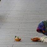 Italian town to fine people who give money to beggars