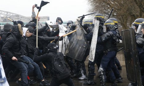 Clashes as French march against labour reforms