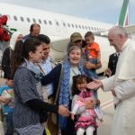 Pope Francis takes 12 refugees back to Vatican