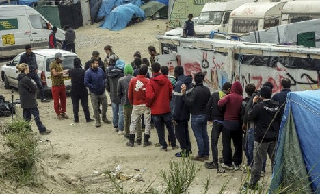 Mass brawl at Calais migrant camp leaves 20 injured