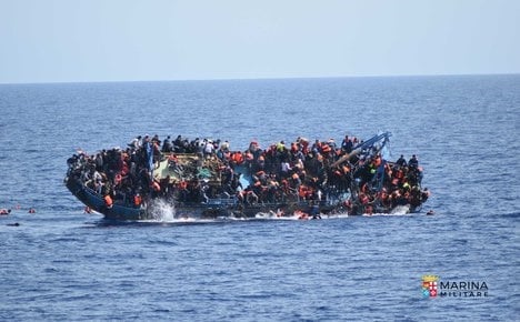 Striking pictures capture moment of migrant shipwreck