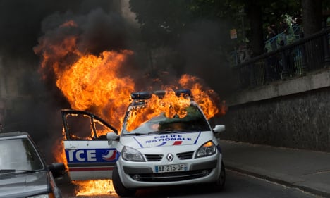 Police car torched in Paris at 'anti-cop hatred' protest