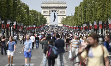 Strolling and selfies as the Champs-Elysees goes car-free