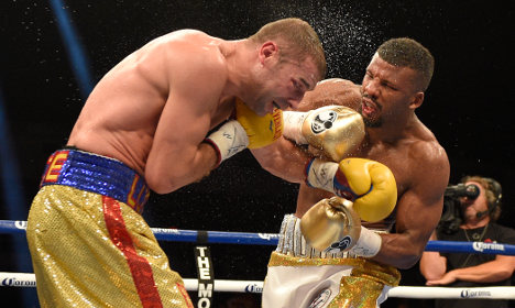'Disgusted' Swedish boxer retains world crown