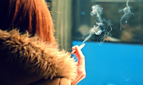 French insurer Axa to stop investing in tobacco industry