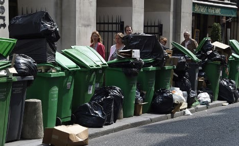 Rubbish piles up on streets of Paris as strikers kick up stink