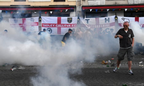 England fans revive old habits as trouble erupts