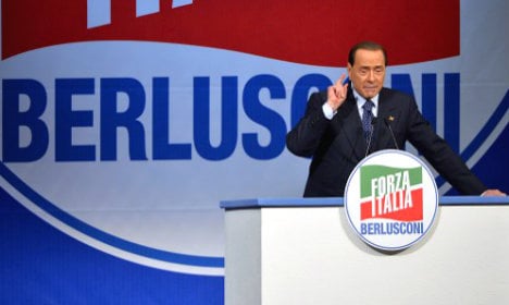 Berlusconi plots Forza Italia relaunch from hospital bed