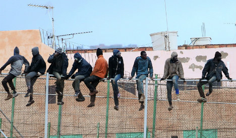 Migrants storm Spain-Morocco border fence