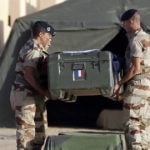 France confirms troops in Libya after three die in combat