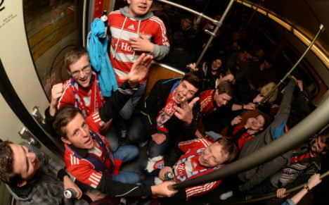 Bayern fans flee after getting trapped in overheated train