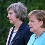 Merkel accepts UK’s decision to delay triggering Brexit