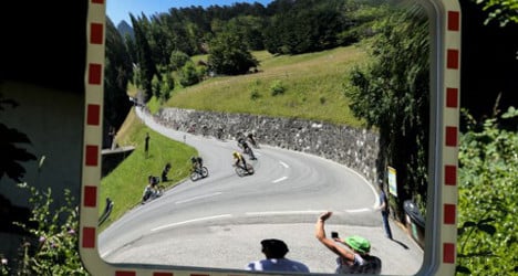 In pictures: Tour de France ends Swiss trip in 35C heat