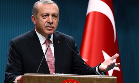 'We'll freeze Turkey talks' warns EU as arrests continue