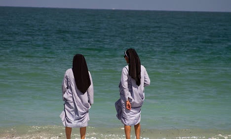 Italy imam defends burqinis with beach-going nuns photo