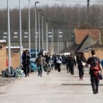 Two injured in shooting at French migrant camp