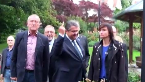 Vice-chancellor Gabriel gives neo-Nazi protesters the finger