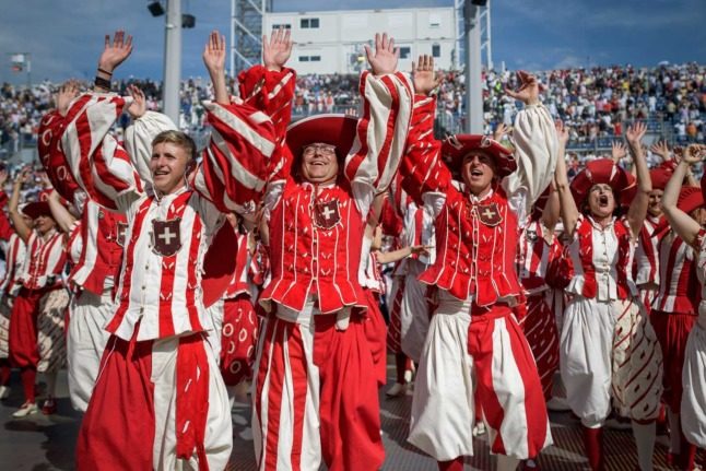 Swiss people in traditional clothing. Photo: FABRICE COFFRINI / AFP