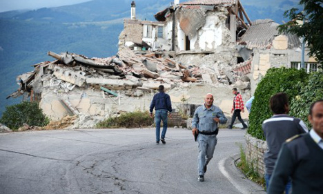 Renzi vows to restore quake towns to former glory