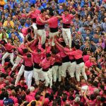 Each team, which includes children, carefully builds its towers competing to reach the greatest height.Photo: Lluis Gene / AFP
