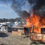 Jungle shacks set ablaze and torn down as camp razed