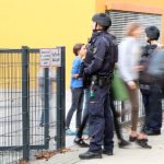 Police search 12 German schools after email threats