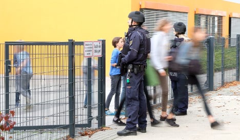 Police search 12 German schools after email threats