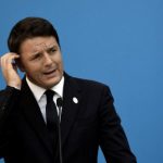 Italy PM Renzi battles to avoid party split over referendum