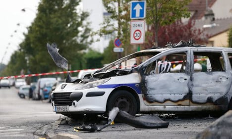 French policeman in coma after fire bomb attack