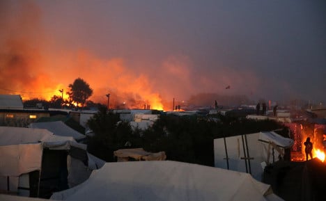 IN PICTURES: Calais Jungle camp goes up in flames
