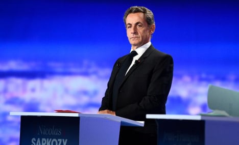 Sarkozy defensive in first French presidential debate