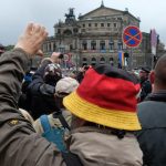 ‘Get out’ jeering crowds tell Merkel in Dresden