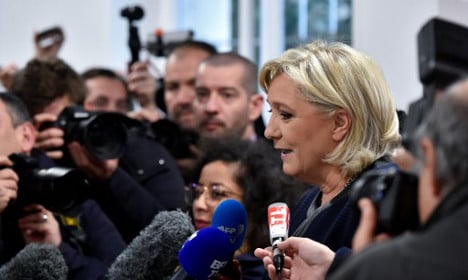 Le Pen opens campaign HQ (up the road from the Elysée)