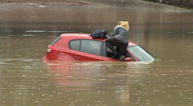 Watch: Dramatic escape of motorist from flooded car in Spain